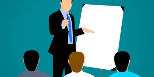 illustration of a person leading a presentation to a small audience